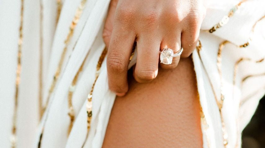 woman wearing a proposal dress and hat
