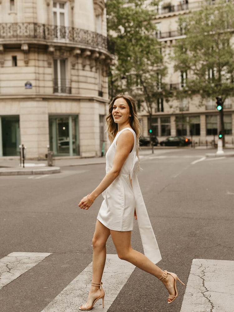 white satin sheath mini dress with bow back for engagement photo dress for bride shot in paris