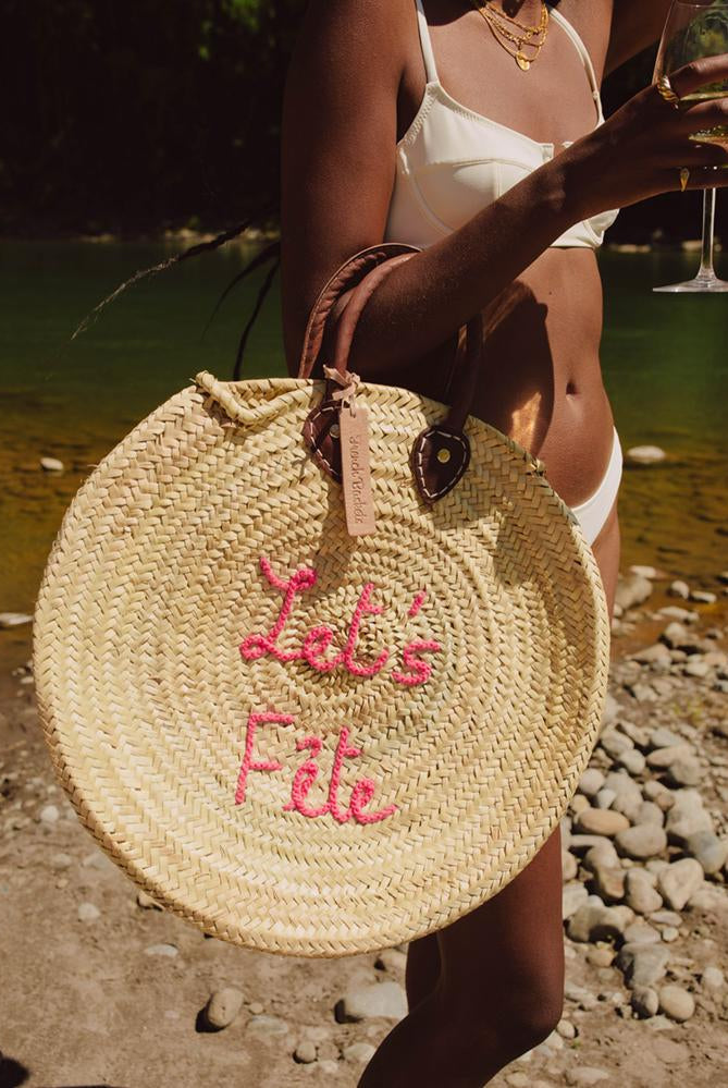woven bags, eco-friendly straw bags, eco-friendly bags, handmade straw bags, made by women, female artisan bags, let's fête round straw bag, straw tote bag, round straw bag, straw bag, circle straw bag, straw circle bag, straw beach bag