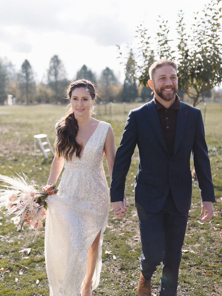 couple dressed up and holding hands