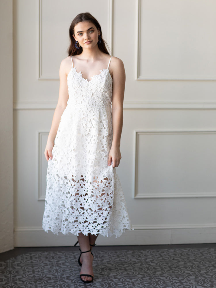 model wearing a floral lace midi dress