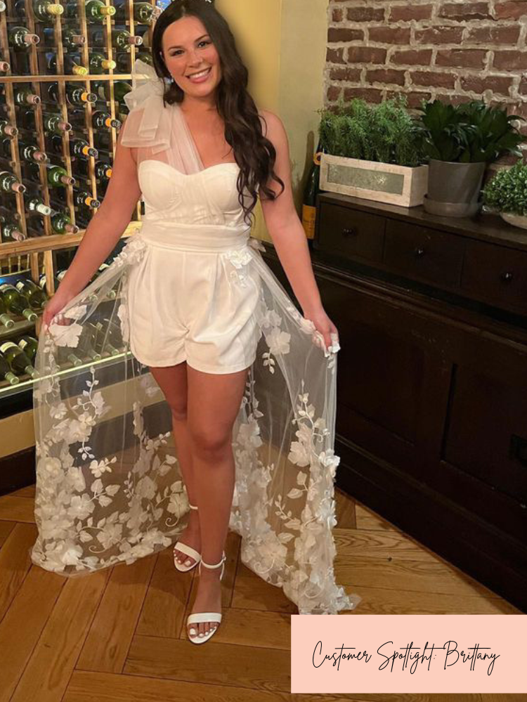 White shorts best sale romper with train