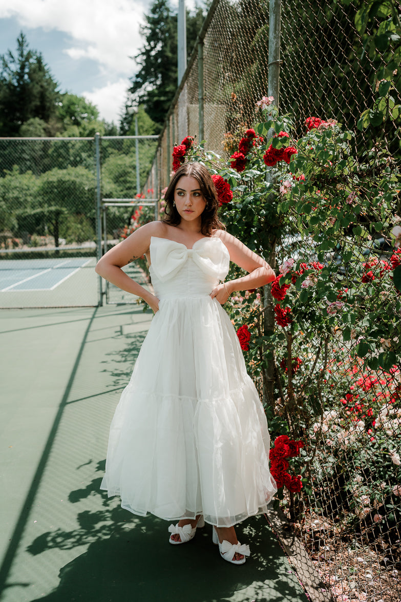 marais white strapless maxi with big bow detail