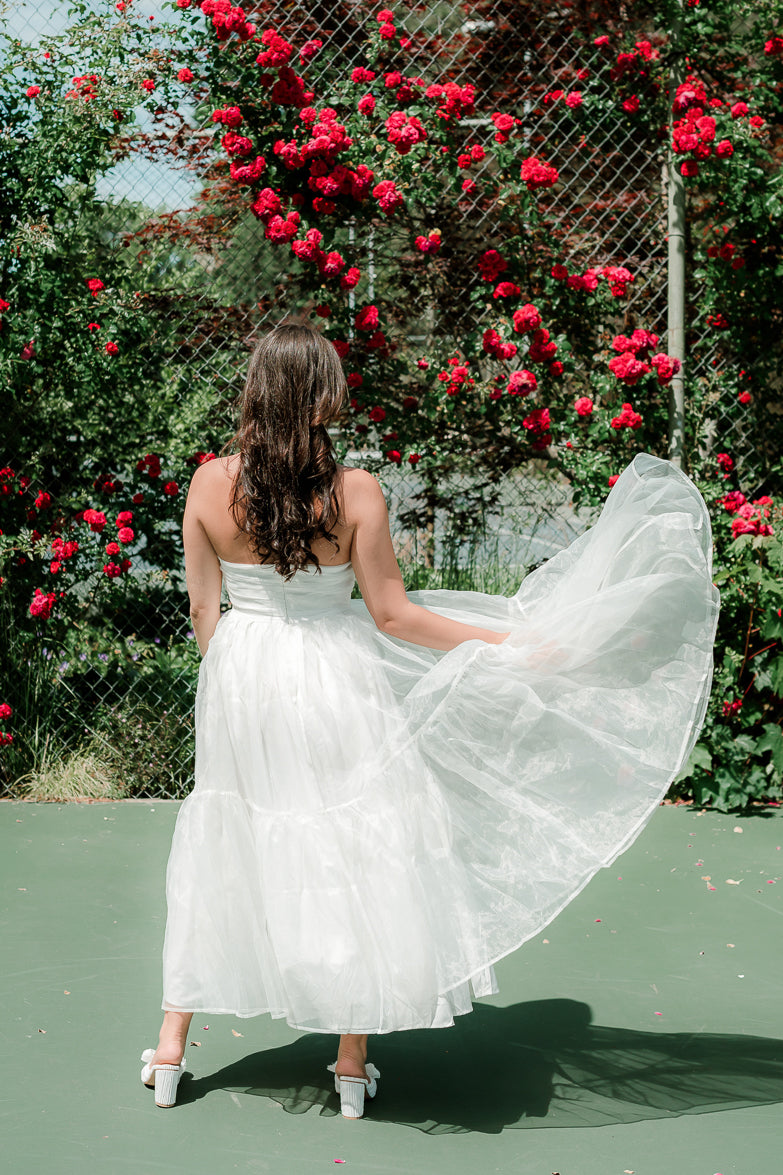 marais white strapless maxi with big bow detail