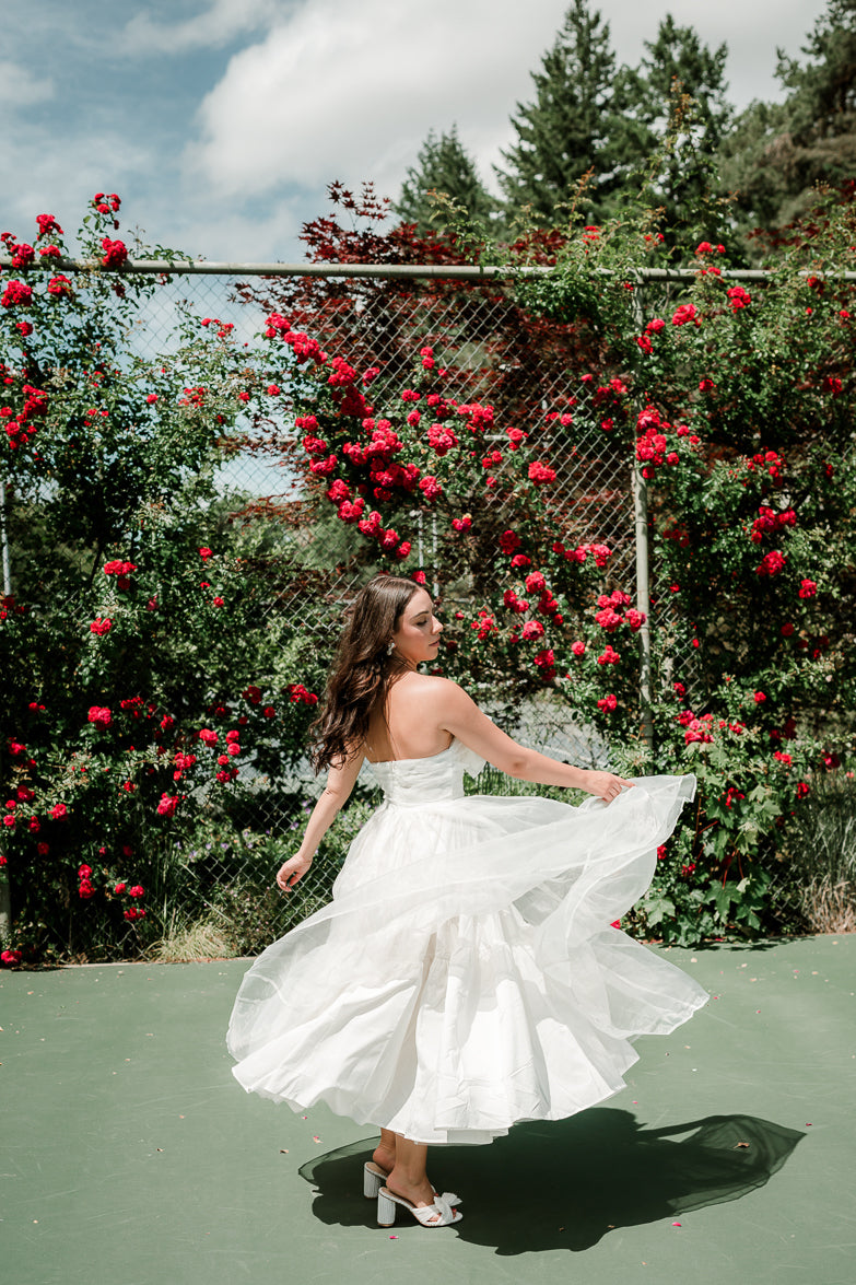 marais white strapless maxi with big bow detail