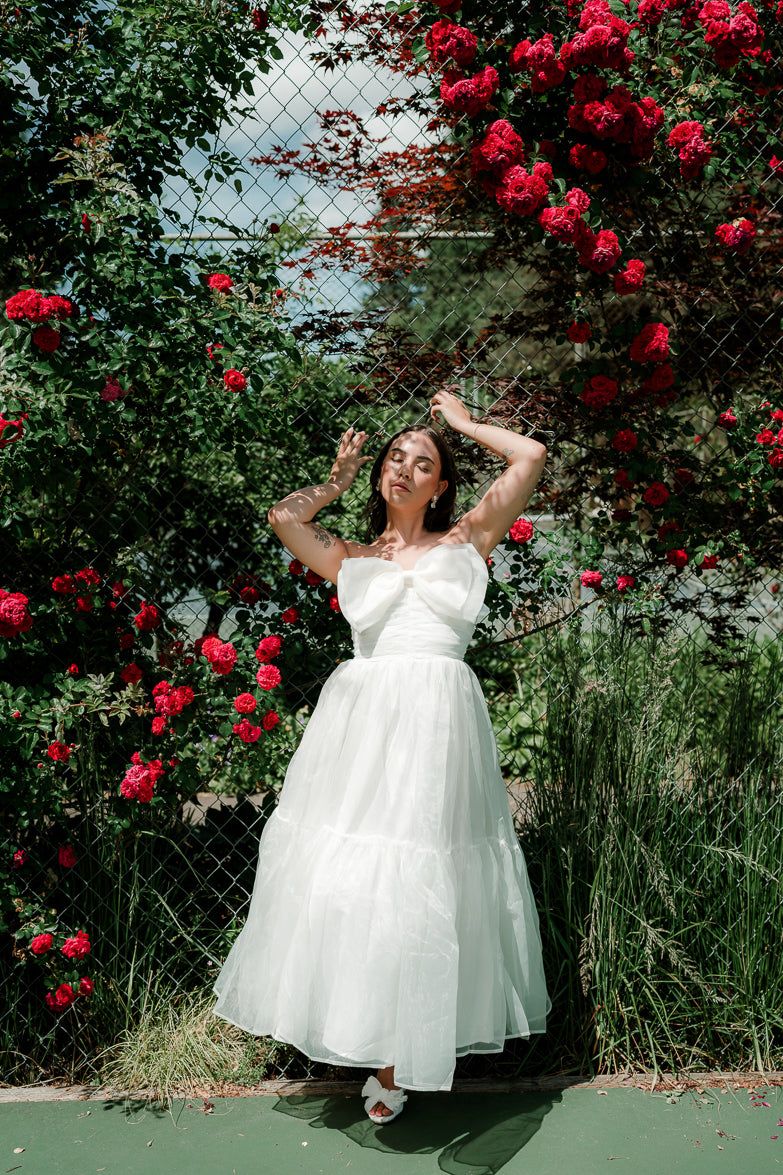 marais white strapless maxi with big bow detail