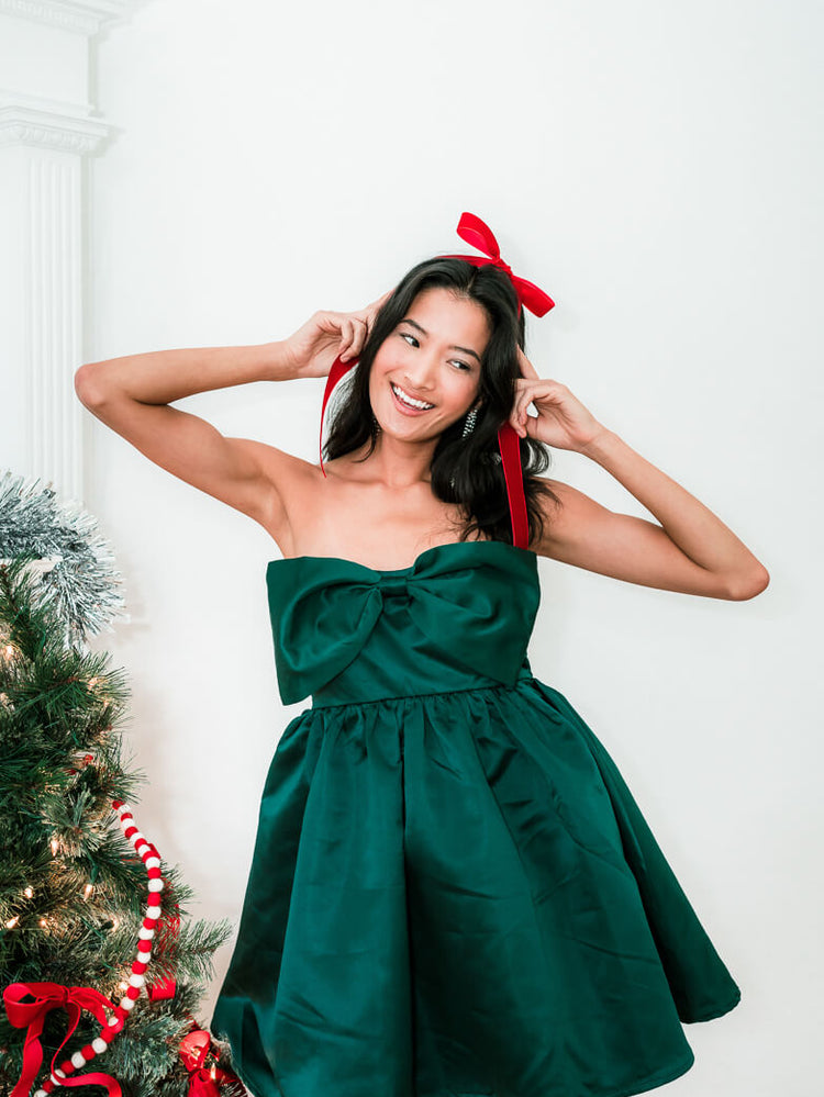 oversized emerald bow mini dress