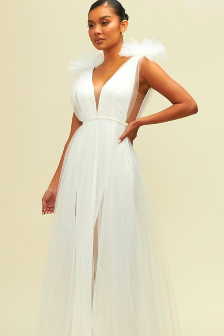 white tulle maxi dress with deep v and decorative shoulder detail