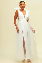 white tulle maxi dress with deep v and decorative shoulder detail