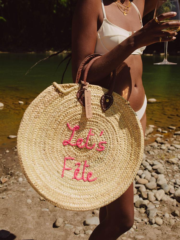 woven bags, eco-friendly straw bags, eco-friendly bags, handmade straw bags, made by women, female artisan bags, let's fête round straw bag, straw tote bag, round straw bag, straw bag, circle straw bag, straw circle bag, straw beach bag