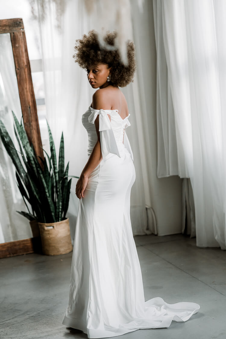 white gown for rehearsal dinner, hailey baldwin rehearsal dinner dupe, white bow tie shoulder dress