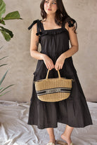 black cotton sundress with pom poms