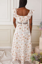 white and pink floral maxi dress with crochet detail